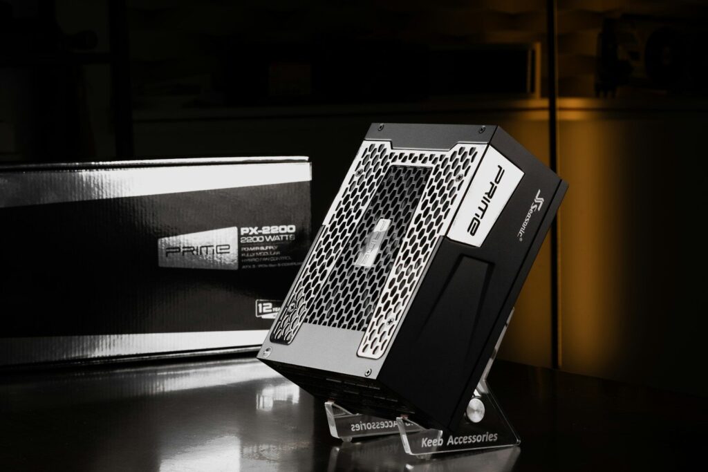 A black and white photo of a computer on a table