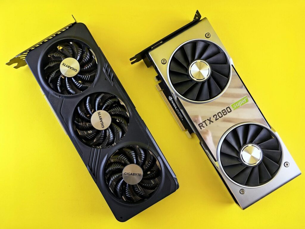Two computer graphics cards on a yellow background