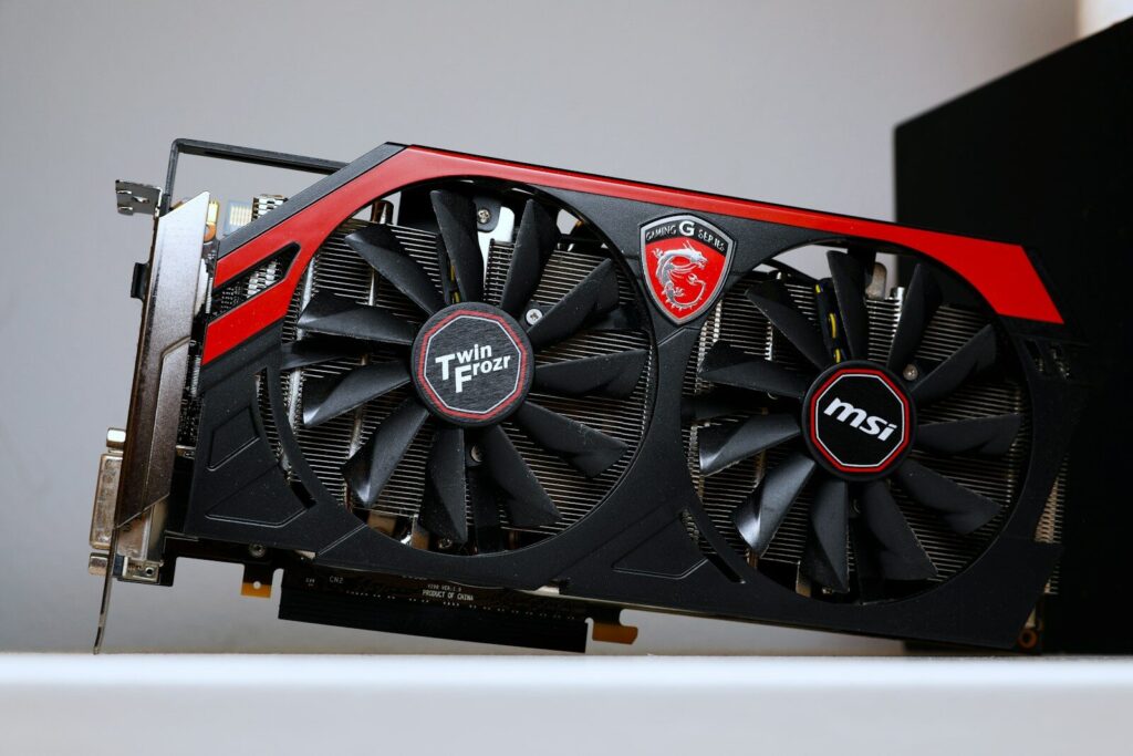 a close up of a red and black graphics card